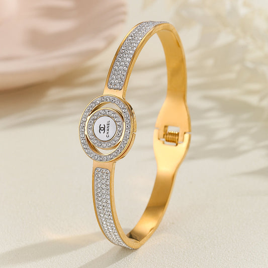 The Gulfessence™ Beautiful Gold Chanel Logo Bangle Bracelet